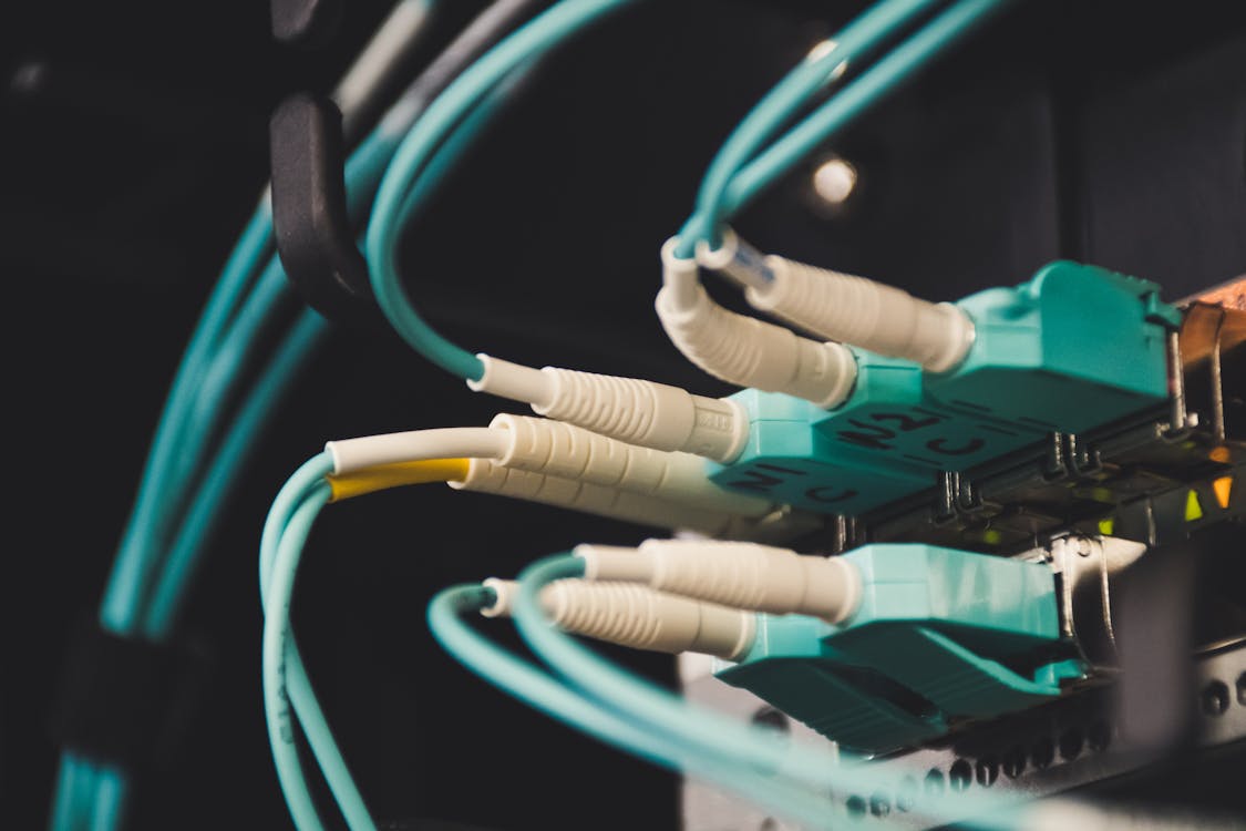 Free Close Up Photo of Plugged Cables Stock Photo
