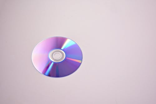Free Disc on Grey Surface Stock Photo