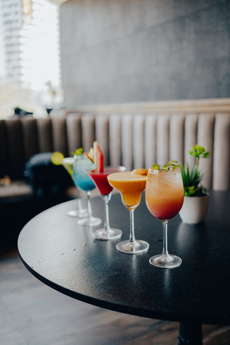 Colorful Cocktails In Glasses On A Table 