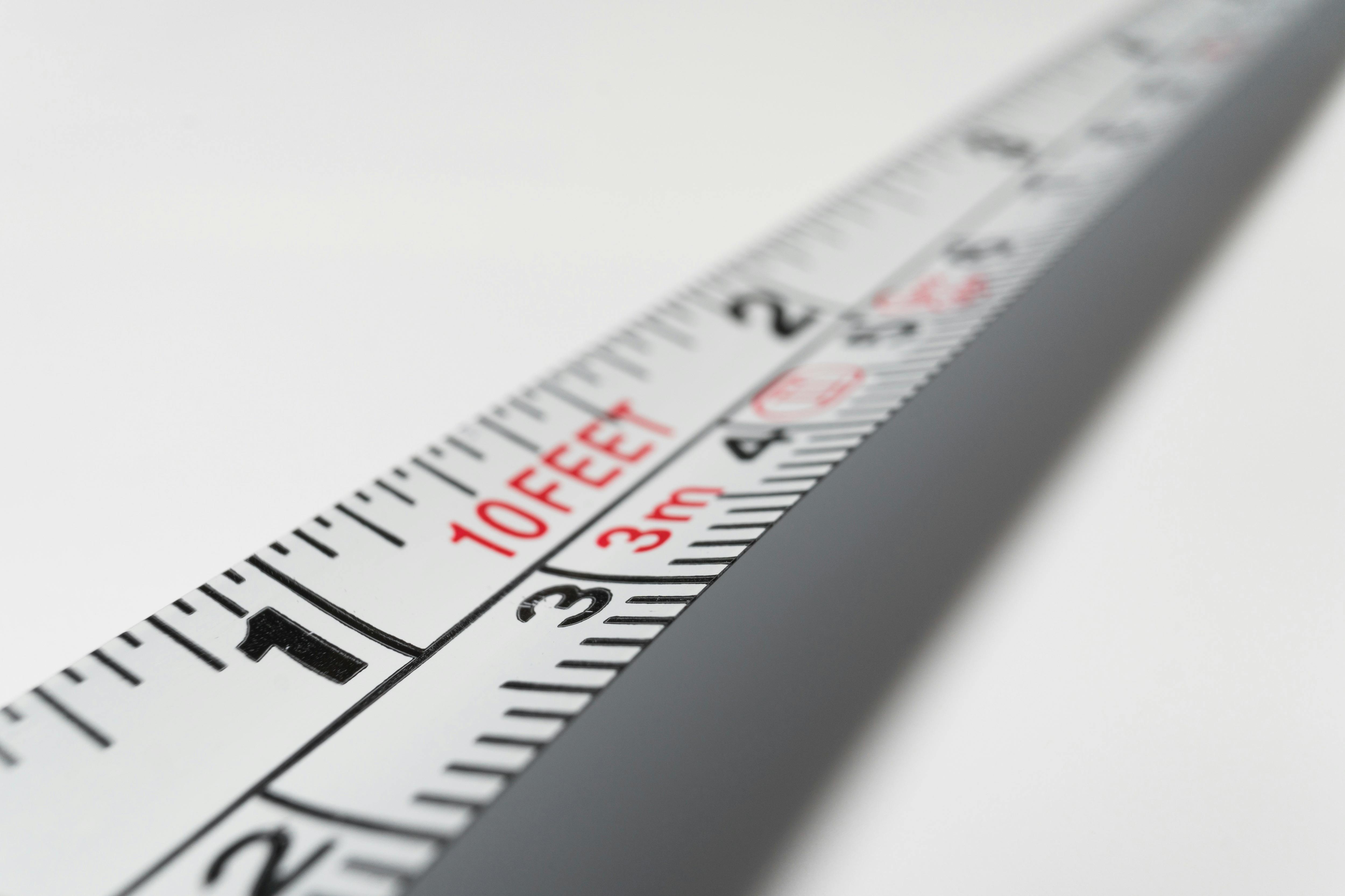 Steel tape measure in inches hi-res stock photography and images