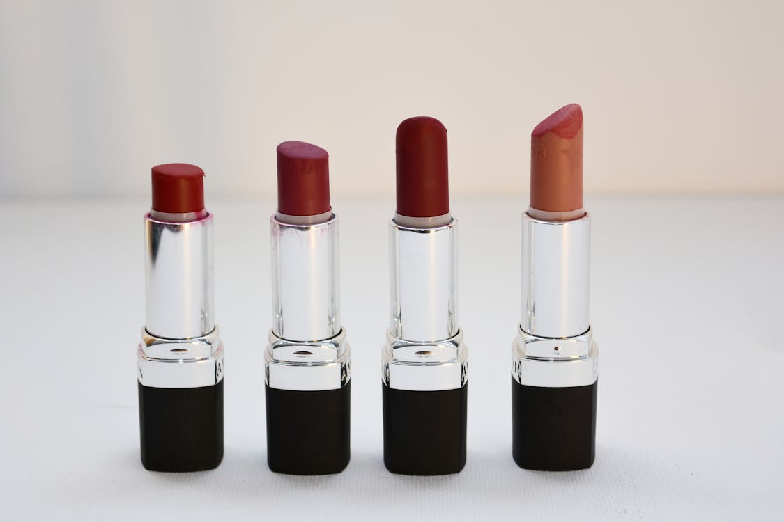 Four Aligned Assorted-color Lipsticks