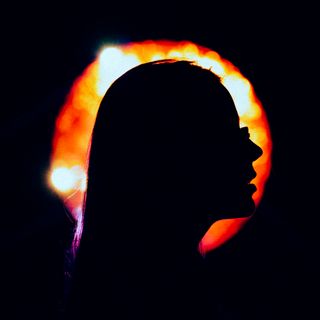 Backlit profile silhouette — photo by Alex Urezkov on Pexels