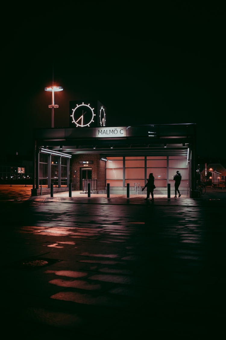 A Building In A City At Night 