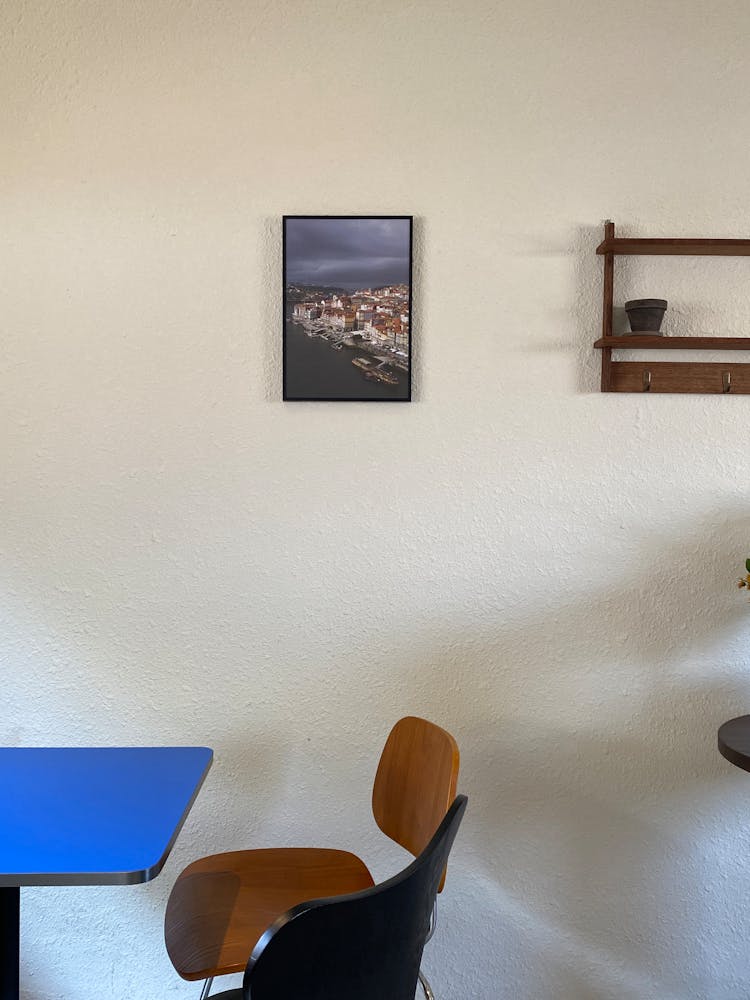 Picture On Wall Over Chair In Room