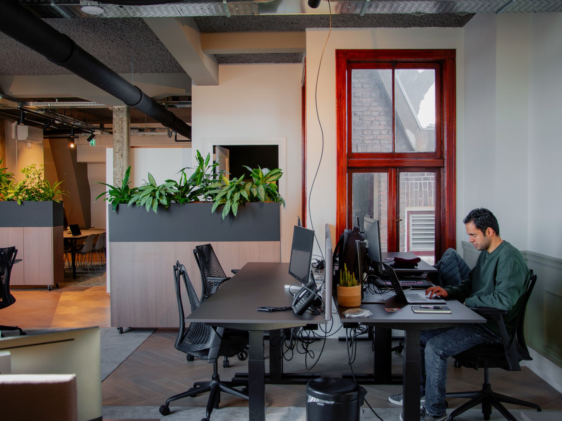 Mells — office relocation team moving desks and equipment