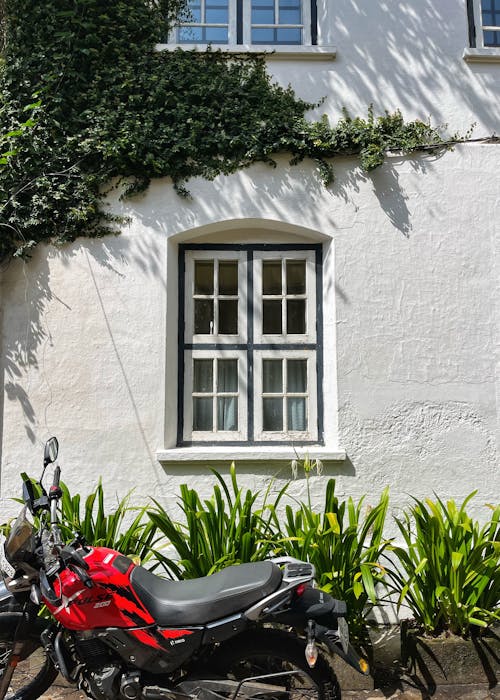 Motorbike Parked by House