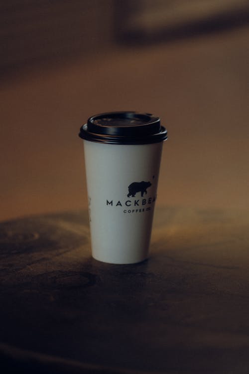 A Disposable Cup of Coffee from a Cafe 