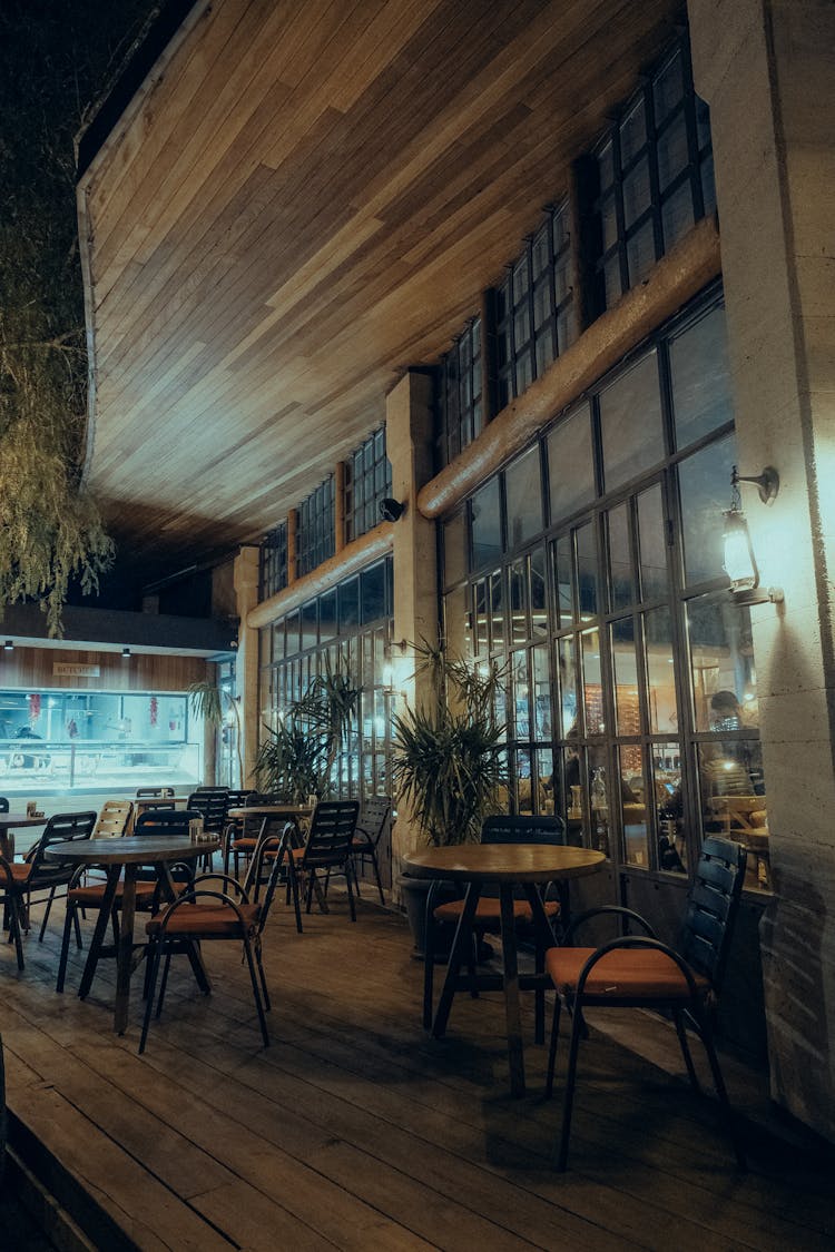 Tables And Seats On A Restaurant Terrace In City 