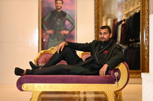 Man Lying on an Antique Sofa