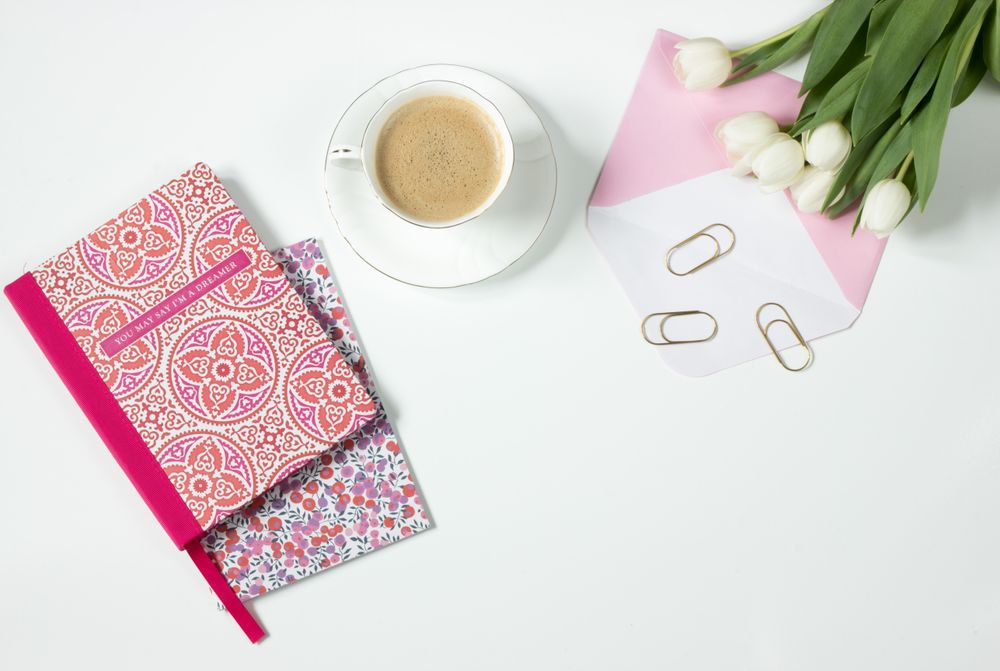 Notebook and coffee photographed by Pixabay on Pexels