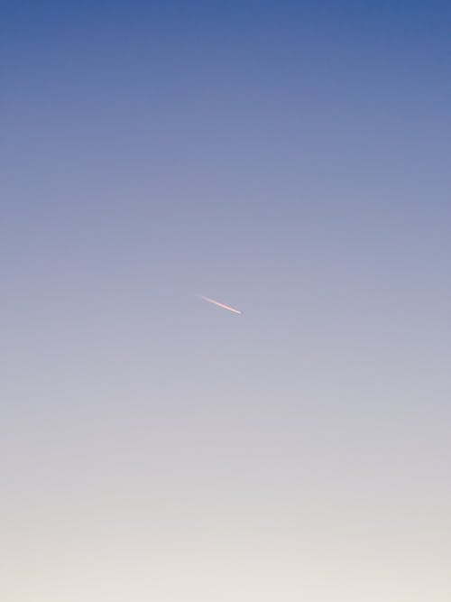 Airplane on the Blue Sky