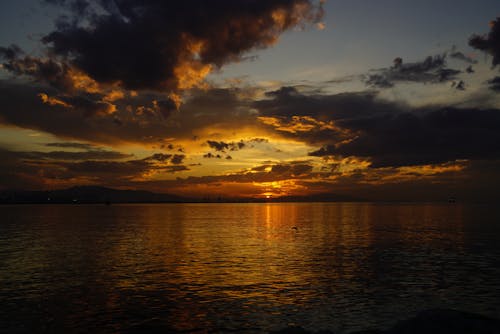 Gratis lagerfoto af atmosfærisk stemning, dramatisk himmel, hav