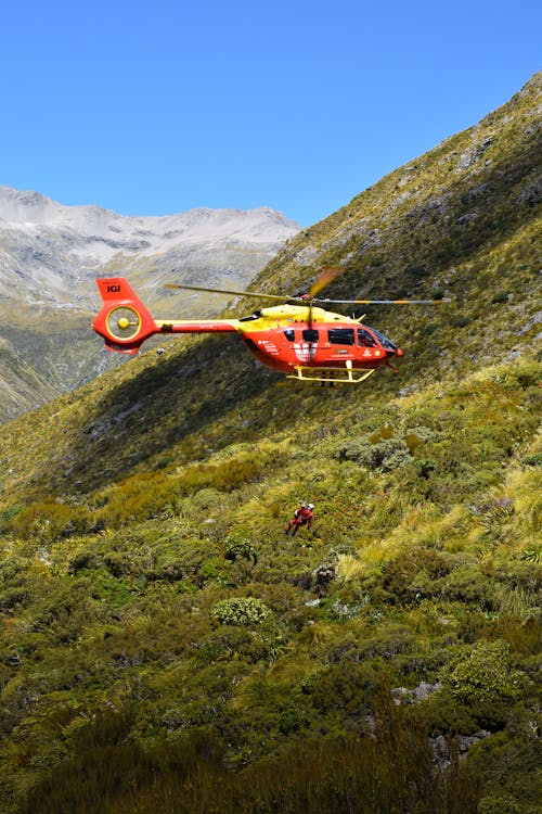 Rescue helicopter in mountains