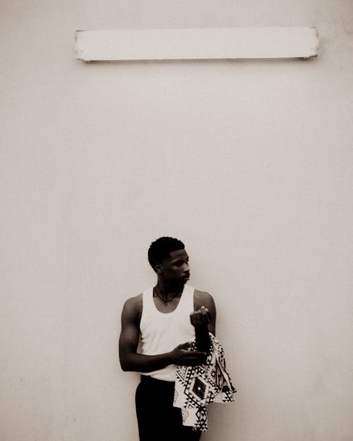 Man Standing near Wall