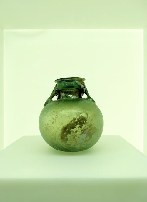 Green Glass Vase on White Surface