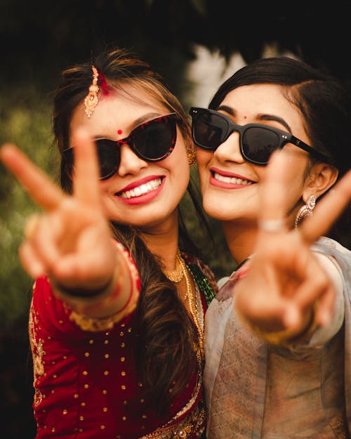 Women Posing in Sunglasses