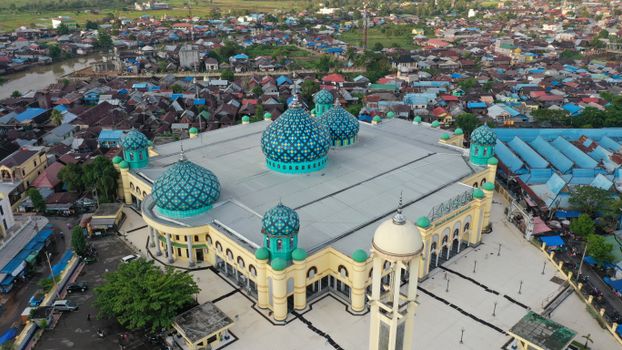 Stunning aerial view of Masjid Agung Al-Karomah mosque in Martapura, Indonesia.