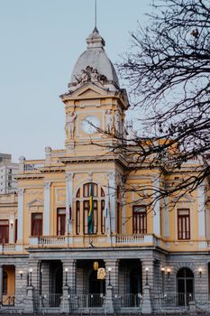 Beautiful old town hall with ornate facade and clock tower.