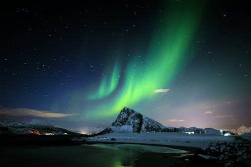 Northern Lights activity above MT. Offersøykammen i Vestvågøy, Lofoten islands