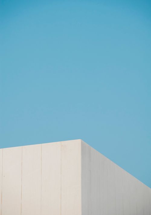 Free Minimalist building corner against a clear blue sky in Dubai, UAE. Stock Photo