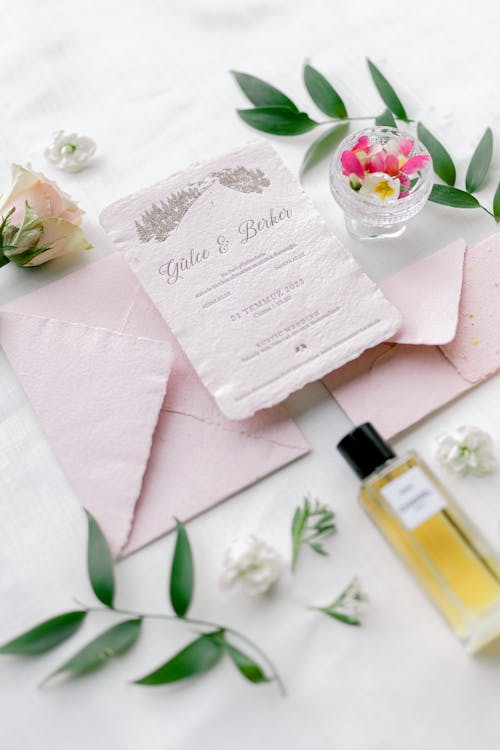 Free Greeting Card and Envelope and a Bottle of Perfume Stock Photo