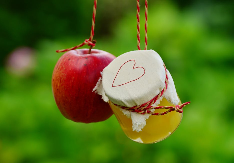 Red Apple Fruit Beside Clear Glass Jar