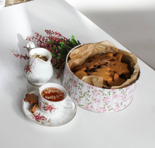 Tea in Cup and Cookies on Table