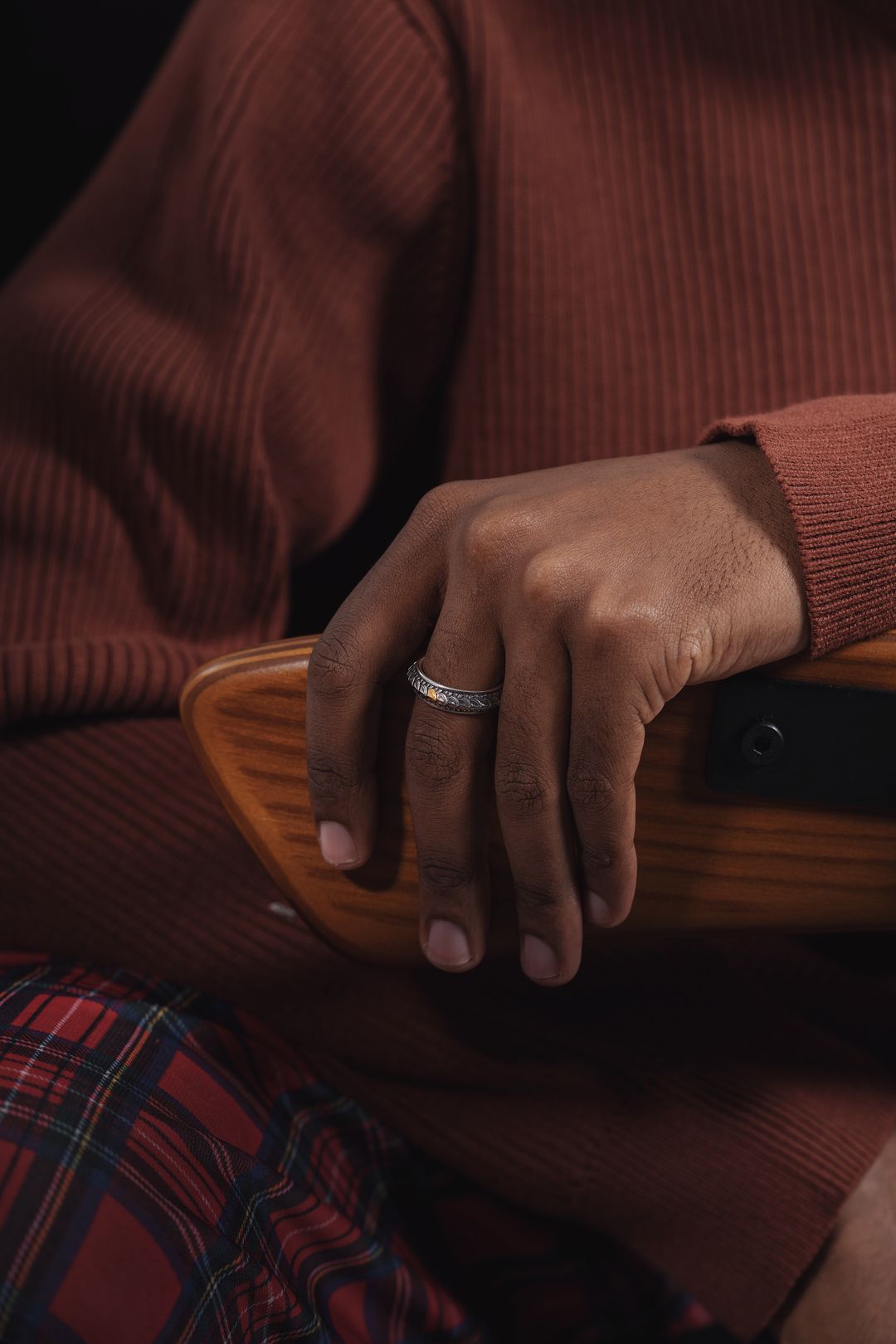 tungsten vs stainless steel ring — masculine silver wedding band on a man's hand — FoundryCut