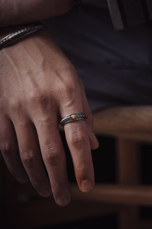 Silver Ring on Mans Hand 