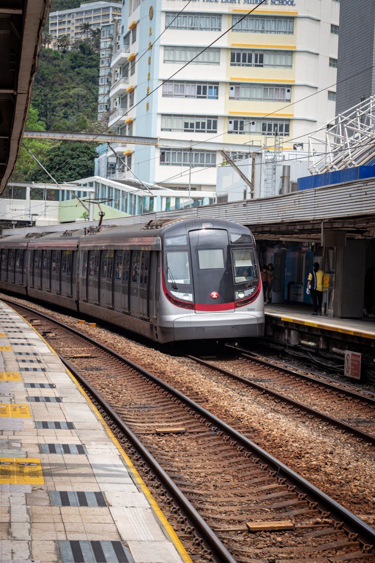 Train In Railroad Tracks On Railway Station