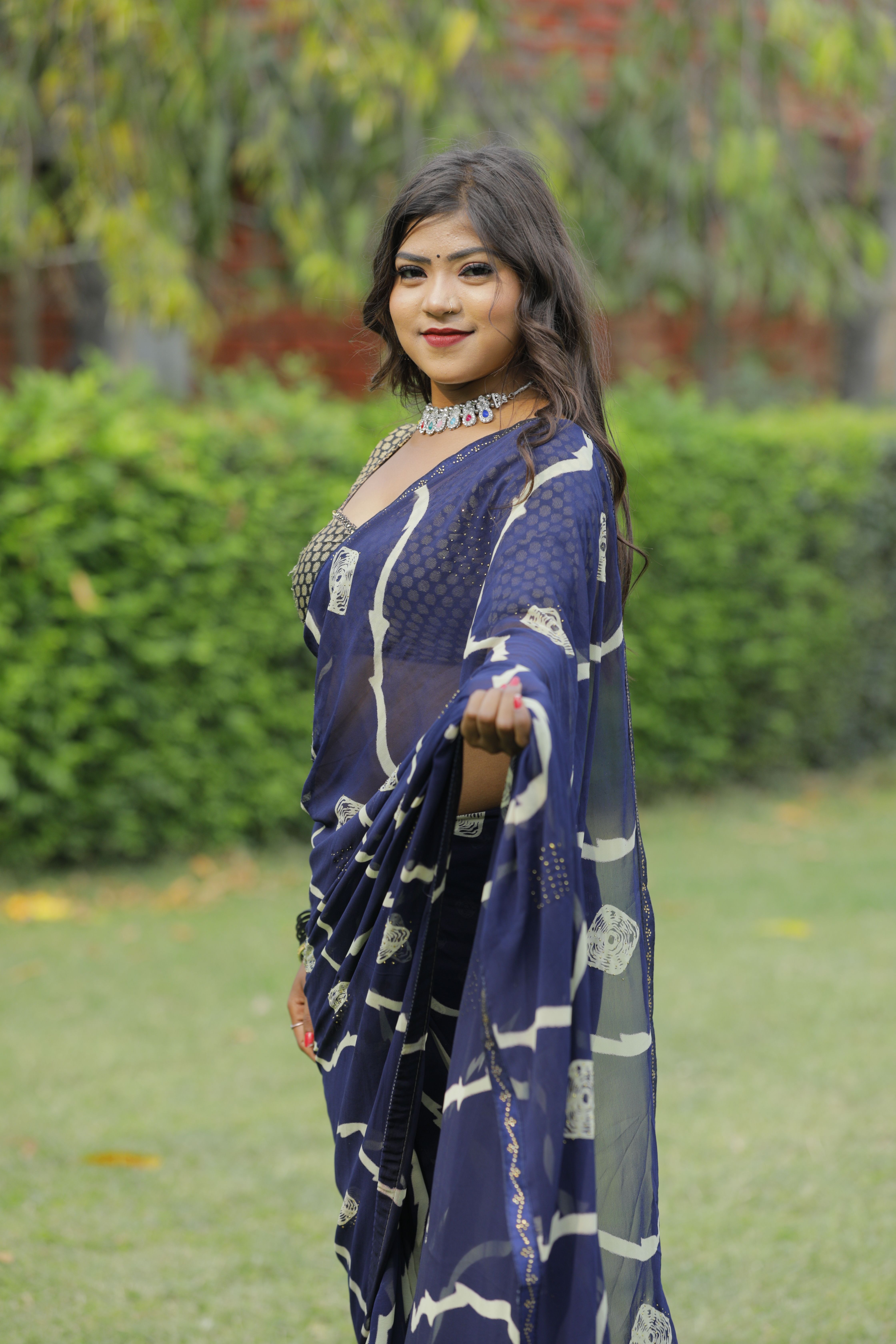 Smiling Woman Posing in Traditional Dress · Free Stock Photo