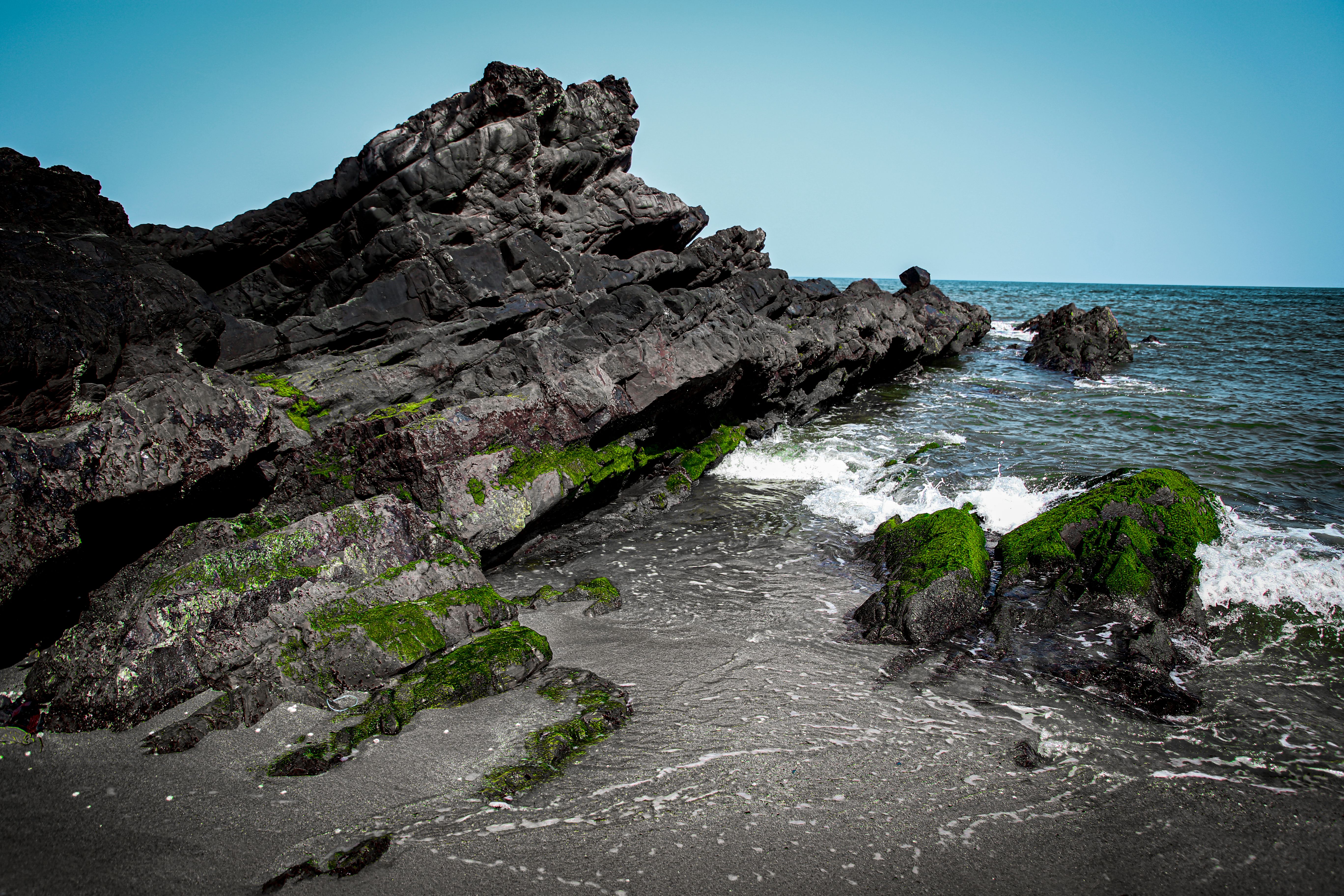 Rocks on a Seashore · Free Stock Photo