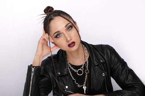 Young Brunette Woman in Leather Jacket