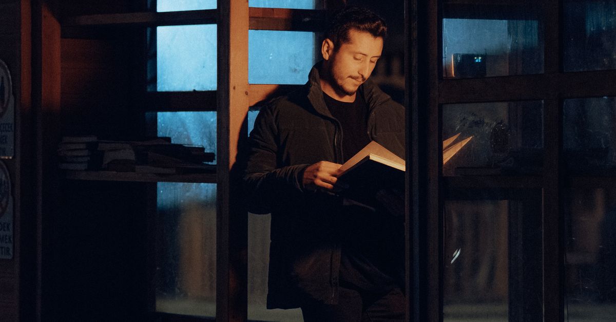Standing Reading Man Standing and Reading Book · Free Stock Photo