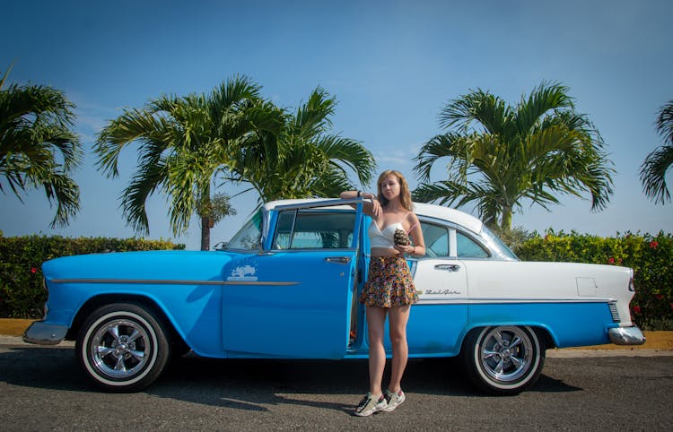 Woman Posing With Chevrolet Bel Air