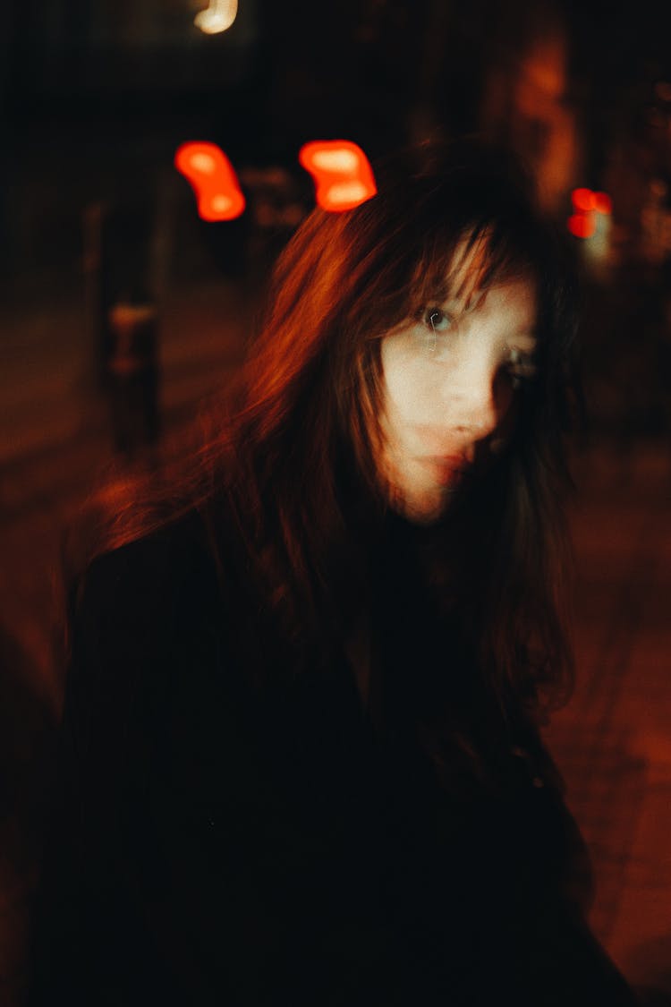 Blurred Woman Face At Night