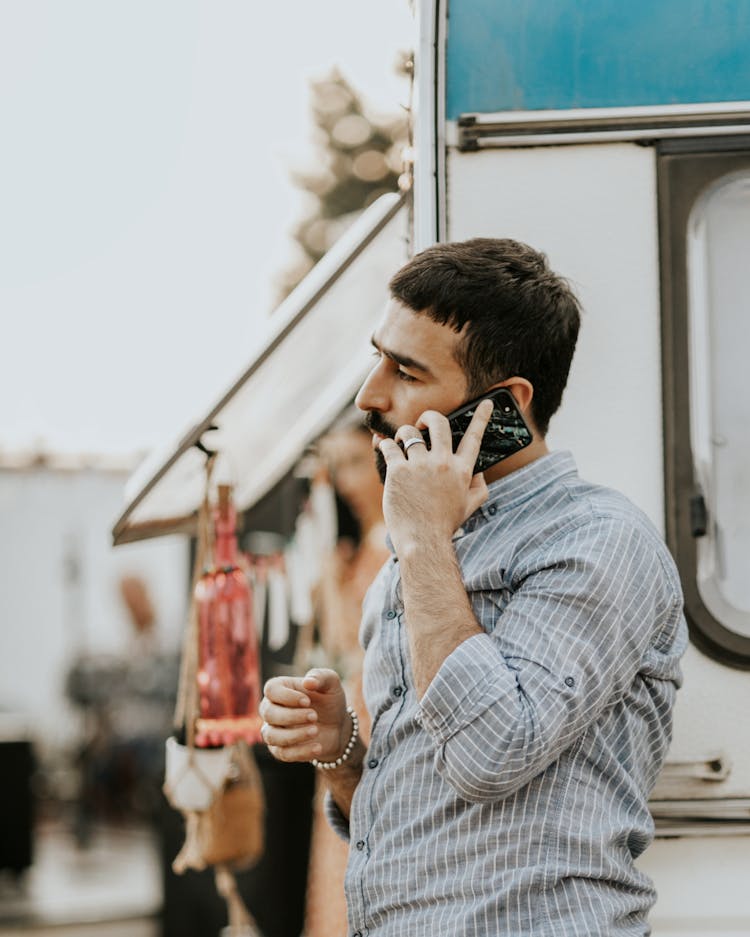 Man Talking On Smartphone