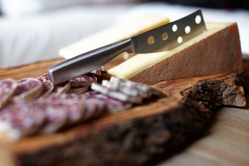 Free Steel Knife on Chopping Board Stock Photo