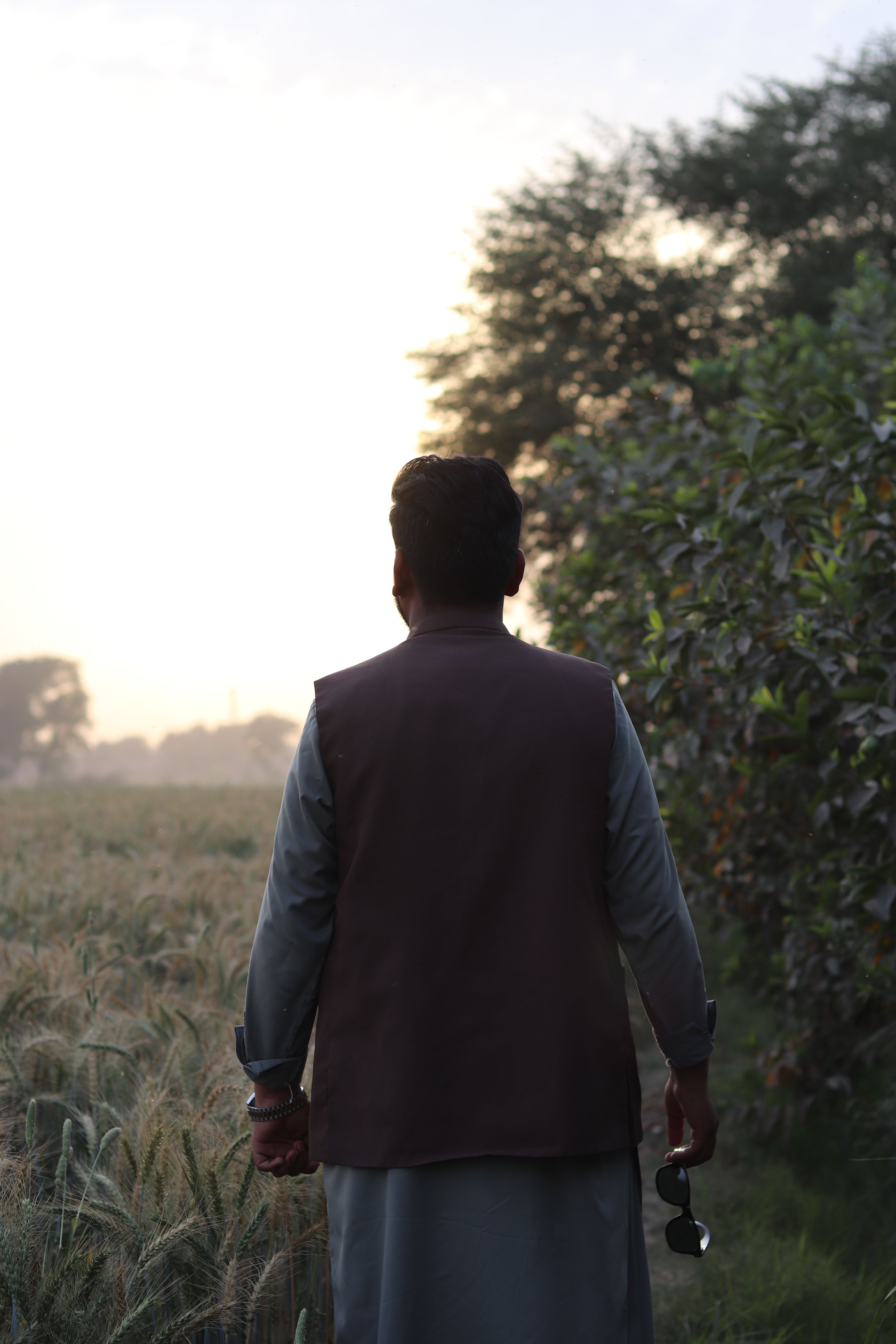 Man Relaxing in Rural Scenery at Dawn · Free Stock Photo