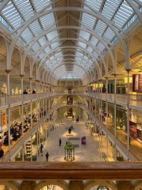 Free Explore the illuminated architecture and mezzanines of the National Museum of Scotland. Stock Photo
