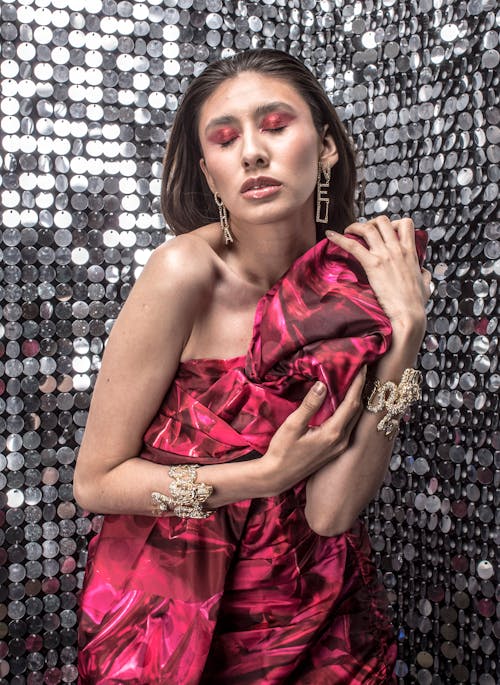 Young Woman in a Pink Dress and Jewelry 