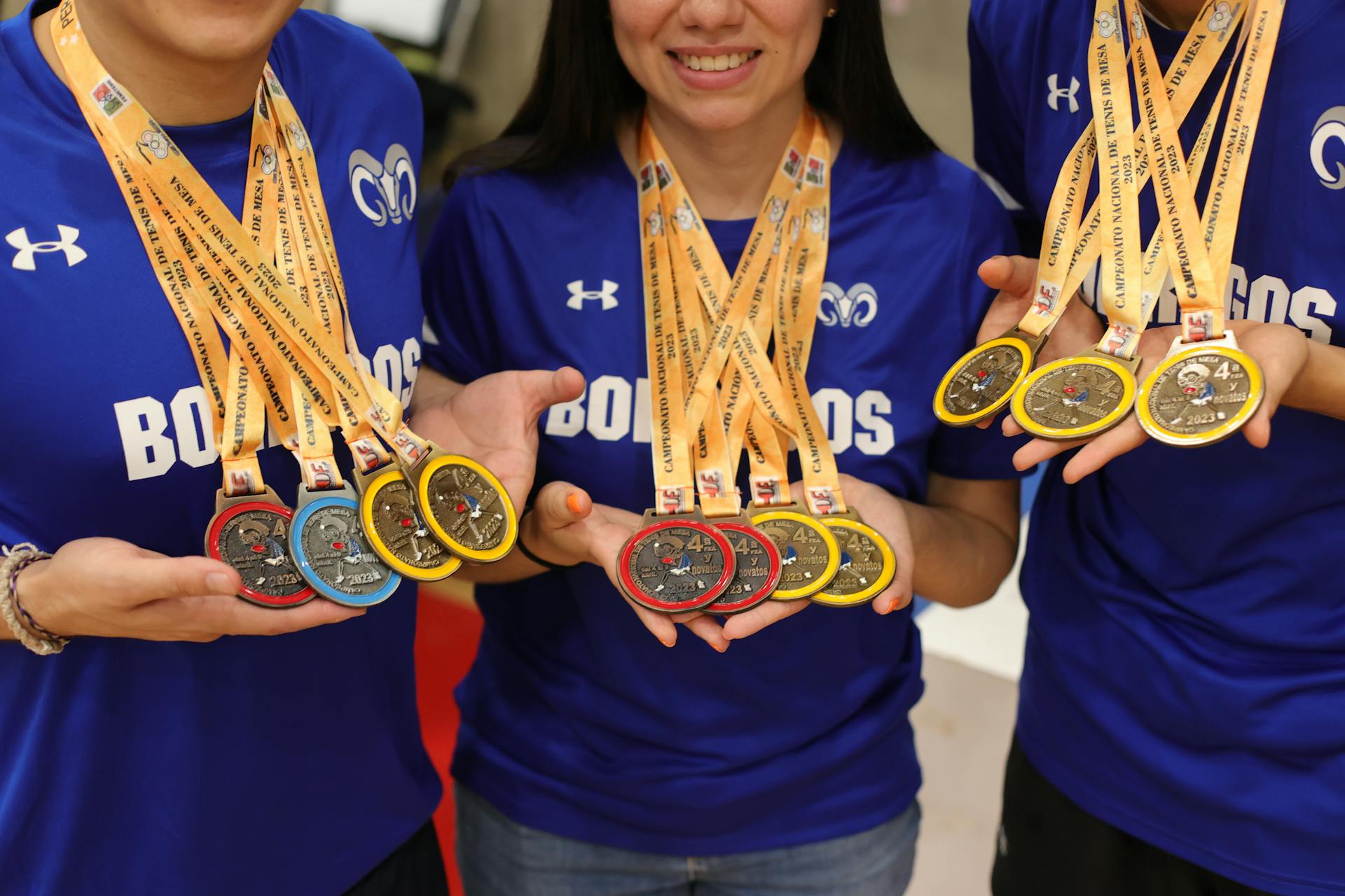 Winners with Medals on Hands