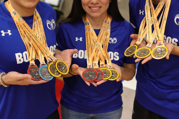 Winners With Medals On Hands