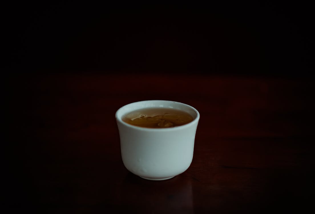 Selective Focus Photo of Cup of Tea