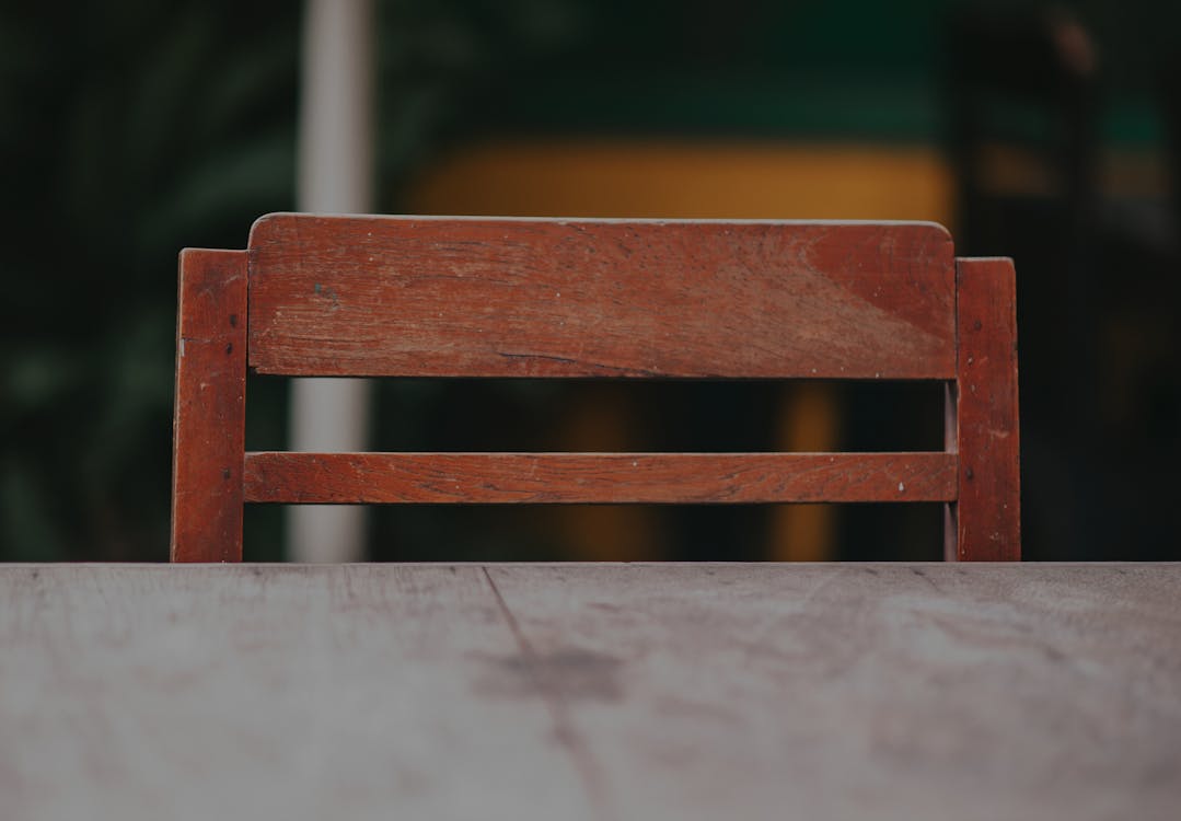 Photo of Wooden Chair Next to Wooden Table