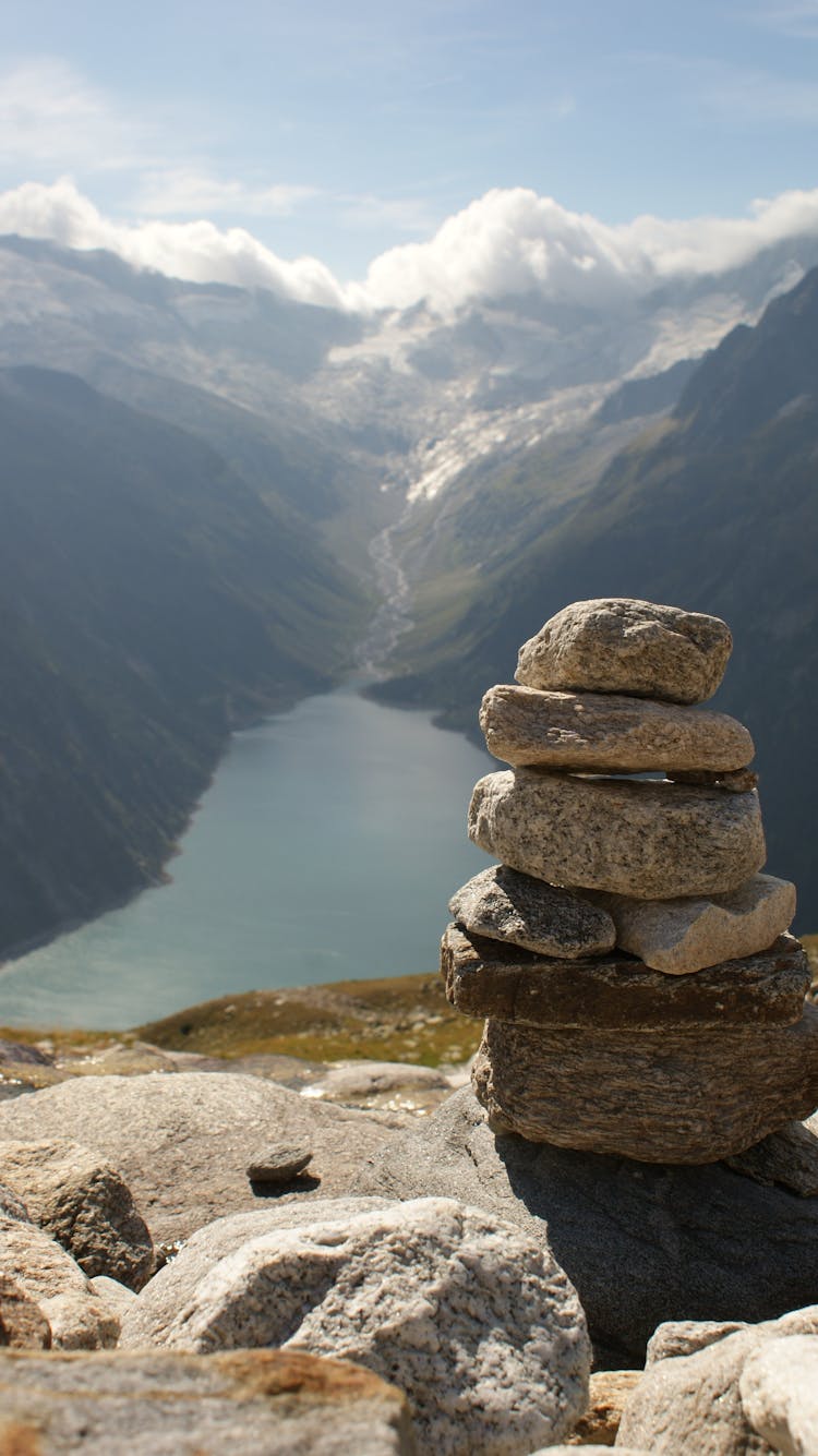 Pile Of Stones In Mountains Landscape