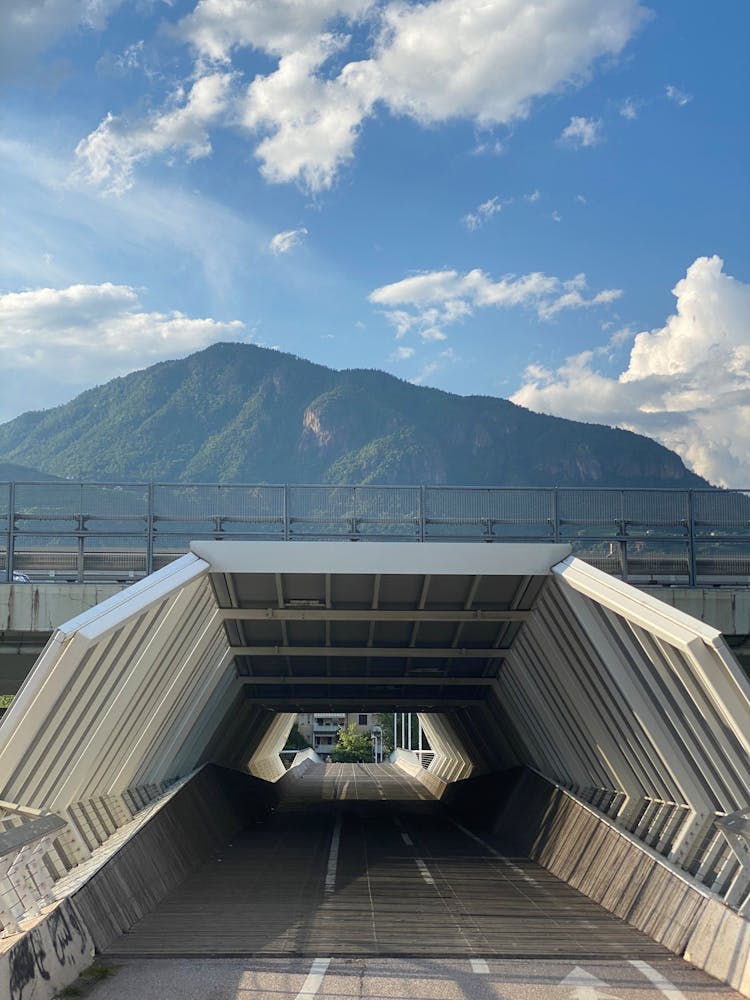 Tunnel And Overpass With A Mountain In The Distance 