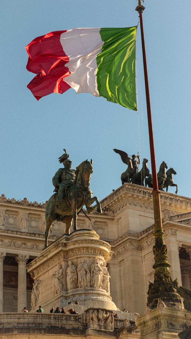 Flagpole And Statues Of The Victor Emmanuel II Monument