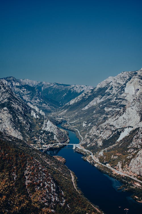 River among Mountains in Snow