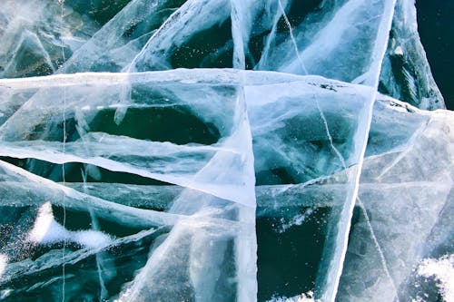Ice crystals on the surface of a body of water